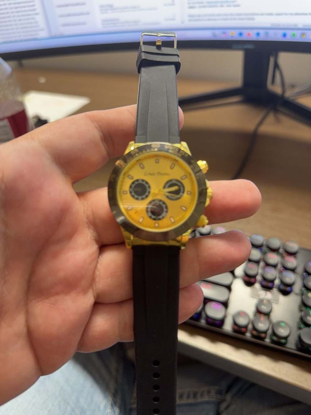 Leuis Poems  Gold Tone Chronograph Watch with Yellow Dial
